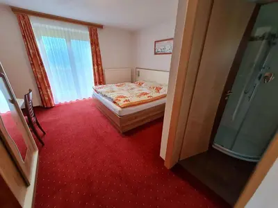 Ein Bett oder Betten in einem Zimmer der Unterkunft Apartement Obweghof Abtenau, Salzburger Land