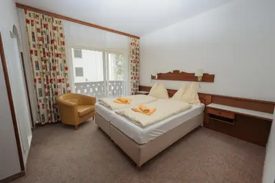 Ein Bett oder Betten in einem Zimmer der Unterkunft Soldanella 1 by Alpenidyll Apartments