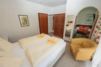 Ein Bett oder Betten in einem Zimmer der Unterkunft Soldanella 1 by Alpenidyll Apartments