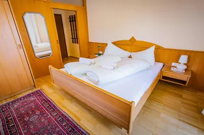 Ein Bett oder Betten in einem Zimmer der Unterkunft Soldanella 2 by Alpenidyll Apartments