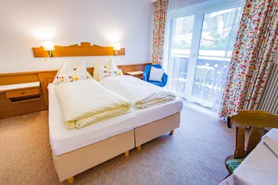 Ein Bett oder Betten in einem Zimmer der Unterkunft Soldanella 6 by Alpenidyll Apartments