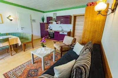 Ein Sitzbereich in der Unterkunft Soldanella 8 by Alpenidyll Apartments