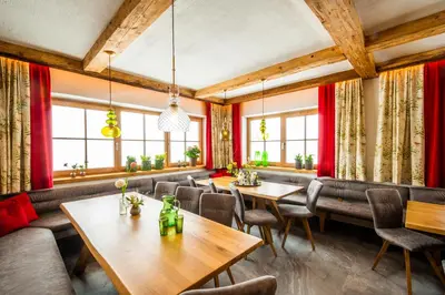 Ein Sitzbereich in der Unterkunft Ferienhaus Mandlberggut