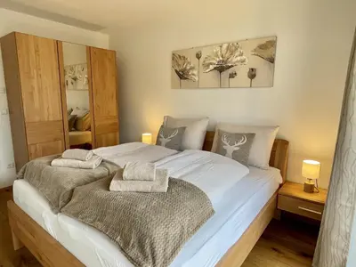 Ein Bett oder Betten in einem Zimmer der Unterkunft Panorama Lodge Mountainview 208