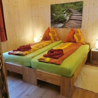 Ein Bett oder Betten in einem Zimmer der Unterkunft Gemütliches Häuschen 