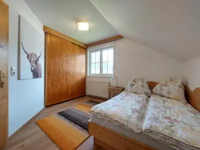 Ein Bett oder Betten in einem Zimmer der Unterkunft Lovely house with mountain view & big garden in Bad Aussee
