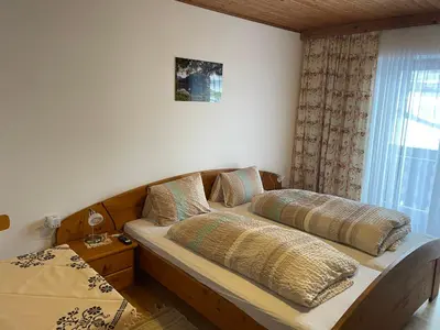 Ein Bett oder Betten in einem Zimmer der Unterkunft Schrahlehen