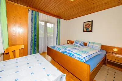 Ein Bett oder Betten in einem Zimmer der Unterkunft Schrahlehen