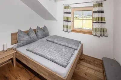 Ein Bett oder Betten in einem Zimmer der Unterkunft Appartements HOAMATGFÜHL
