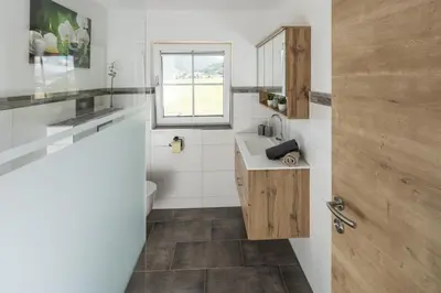 Ein Badezimmer in der Unterkunft Appartements HOAMATGFÜHL
