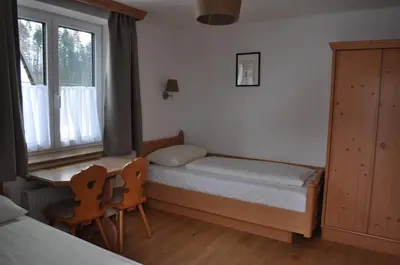 Ein Bett oder Betten in einem Zimmer der Unterkunft Ferienhotel Gut Enghagen