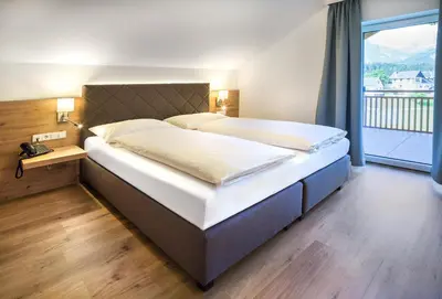 Ein Bett oder Betten in einem Zimmer der Unterkunft Appartementhaus Madlen