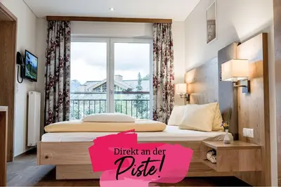 Ein Bett oder Betten in einem Zimmer der Unterkunft Die Barbara Appartements & Zimmer