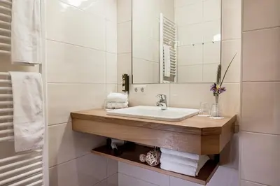 Ein Badezimmer in der Unterkunft Die Barbara Appartements & Zimmer