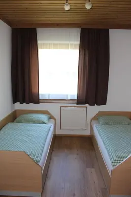 Ein Bett oder Betten in einem Zimmer der Unterkunft Apartment-Kraft