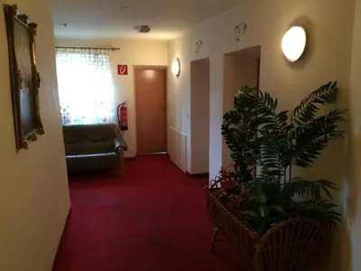 Ein Sitzbereich in der Unterkunft Gasthof Knappenwirt