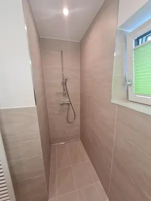 Ein Badezimmer in der Unterkunft FrIda Appartements