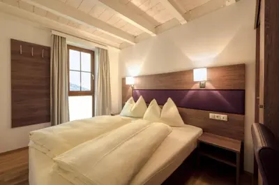 Ein Bett oder Betten in einem Zimmer der Unterkunft Aigenberg Appartements