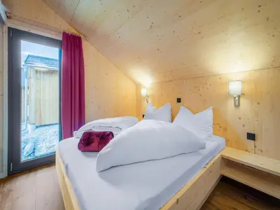 Ein Bett oder Betten in einem Zimmer der Unterkunft Chalet in Hohentauern nahe Skilift