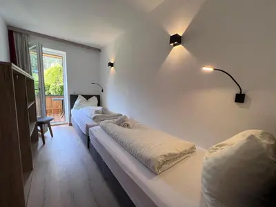 Ein Bett oder Betten in einem Zimmer der Unterkunft Apartments Monika - Altenmarkt