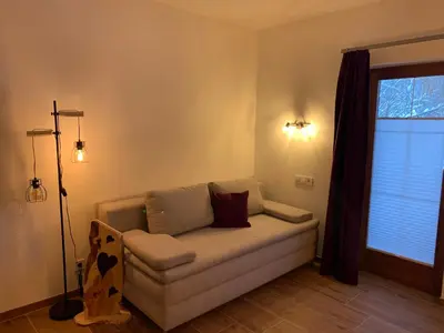 Ein Sitzbereich in der Unterkunft Appartments Zirbennest