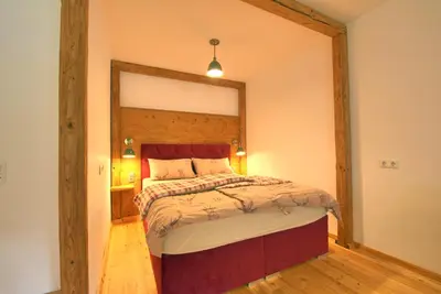 Ein Bett oder Betten in einem Zimmer der Unterkunft Alpen Apartment Werfenweng - Ruhe - Pool
