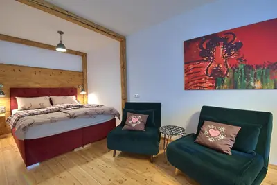 Ein Bett oder Betten in einem Zimmer der Unterkunft Alpen Apartment Werfenweng - Ruhe - Pool