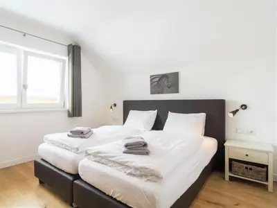 Ein Bett oder Betten in einem Zimmer der Unterkunft Sonnenalm