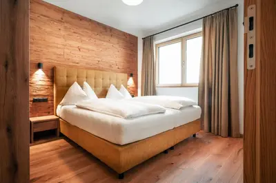 Ein Bett oder Betten in einem Zimmer der Unterkunft Sun Side by Schladming-Appartements