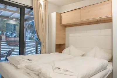 Ein Bett oder Betten in einem Zimmer der Unterkunft Pension Schizentrum Grosseck - Speiereck
