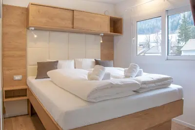 Ein Bett oder Betten in einem Zimmer der Unterkunft Pension Schizentrum Grosseck - Speiereck