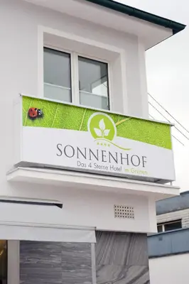 Ein Zertifikat, Auszeichnung, Logo oder anderes Dokument, das in der Unterkunft Ferienwohnungen - Boarding Wohnungen Sonnenhof ausgestellt ist
