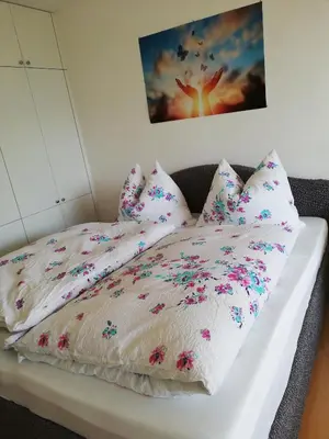 Ein Bett oder Betten in einem Zimmer der Unterkunft Lebensfreude Appartement
