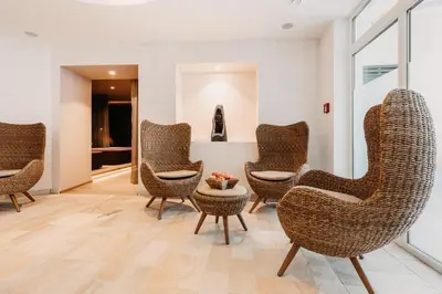 Ein Sitzbereich in der Unterkunft Aparthotel Rubinius
