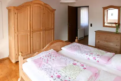 Ein Bett oder Betten in einem Zimmer der Unterkunft Cosy apartment Bad Ischl in quiet residential area - newly renovated