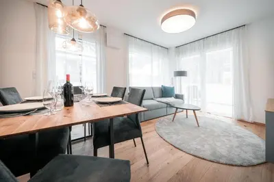 Ein Sitzbereich in der Unterkunft Das Conrad by Schladming-Appartements