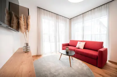 Ein Sitzbereich in der Unterkunft Das Conrad by Schladming-Appartements