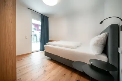 Ein Bett oder Betten in einem Zimmer der Unterkunft Das Conrad by Schladming-Appartements