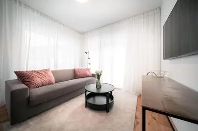 Ein Sitzbereich in der Unterkunft Das Conrad by Schladming-Appartements