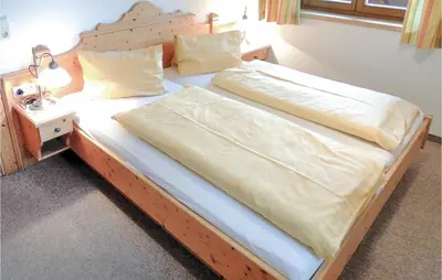 Ein Bett oder Betten in einem Zimmer der Unterkunft Helle Ferienwohnung In Flachau