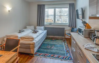 Ein Bett oder Betten in einem Zimmer der Unterkunft Attraktive Ferienwohnung Wagr