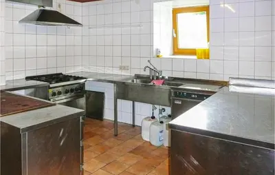 Küche/Küchenzeile in der Unterkunft Ferienwohnung Mit Badeteich