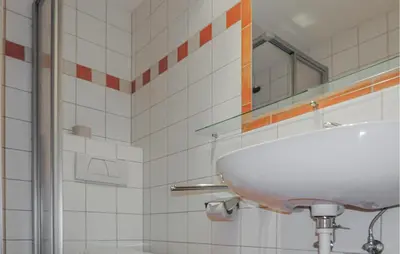 Ein Badezimmer in der Unterkunft Ferienwohnung Mit Badeteich