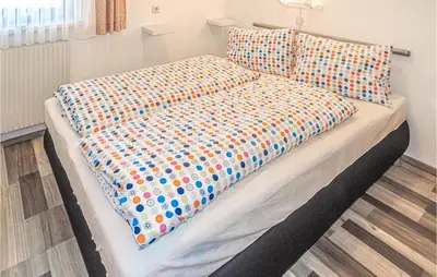 Ein Bett oder Betten in einem Zimmer der Unterkunft Nette Ferienwohnung Kleinarl