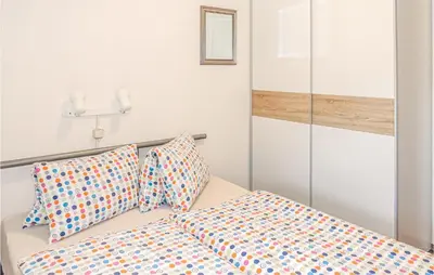 Ein Bett oder Betten in einem Zimmer der Unterkunft Nette Ferienwohnung Kleinarl