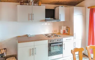 Küche/Küchenzeile in der Unterkunft Ferienhaus Mit Ausblick