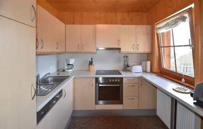 Küche/Küchenzeile in der Unterkunft Ferienhaus Mit Sauna