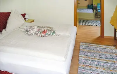 Ein Bett oder Betten in einem Zimmer der Unterkunft Ferienhaus In Ruhiger Lage