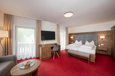 Ein Bett oder Betten in einem Zimmer der Unterkunft Hotel Dachstein