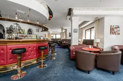 Ein Sitzbereich in der Unterkunft Hotel Dachstein